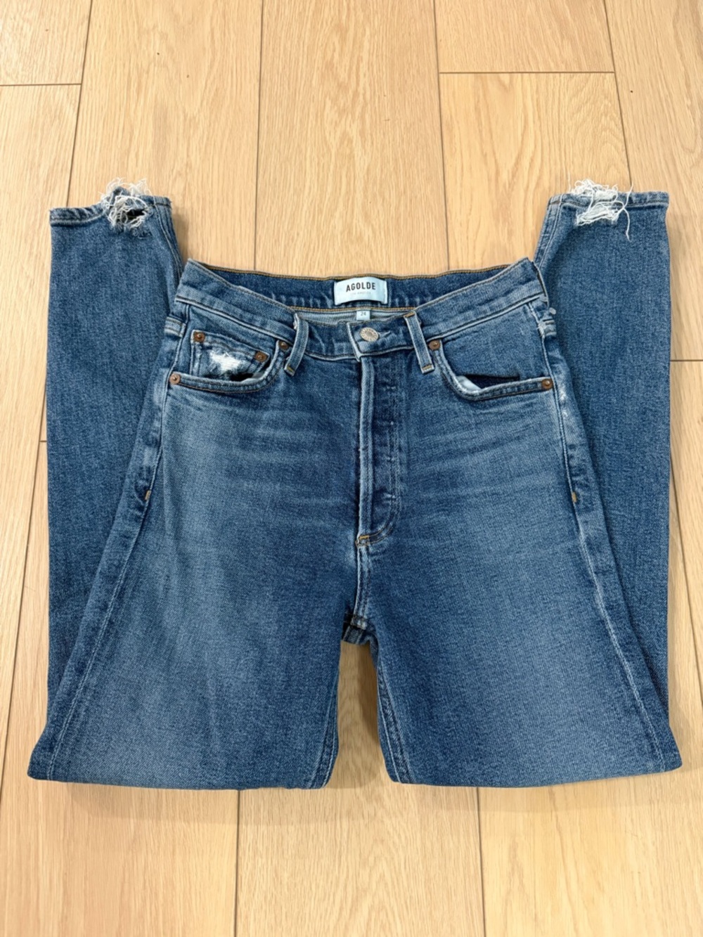 Agolde High-Rise Skinny Jeans in Medium Wash Blue with Frayed Hem